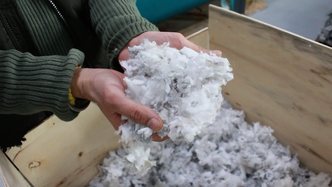 recycled PET material from post-consumer plastic bottles
