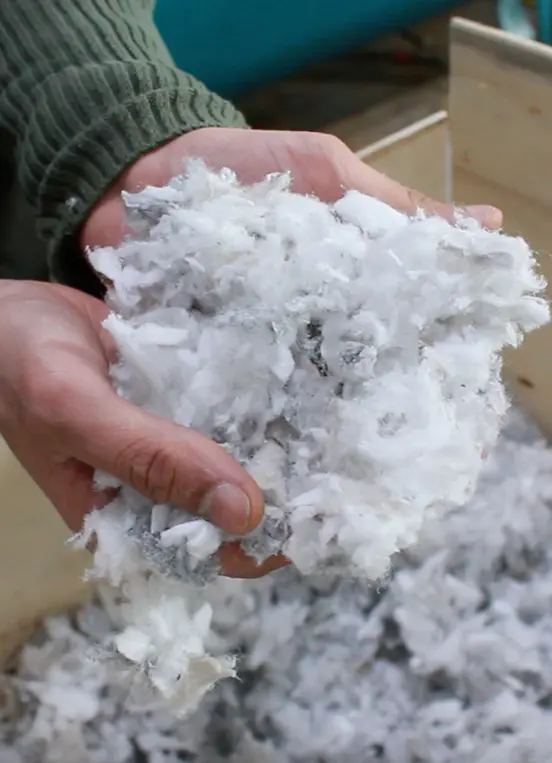 recycled PET material from post-consumer plastic bottles