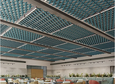 Restaurant interior featuring blue and green acoustic ceiling tiles, creating a vibrant and inviting atmosphere.