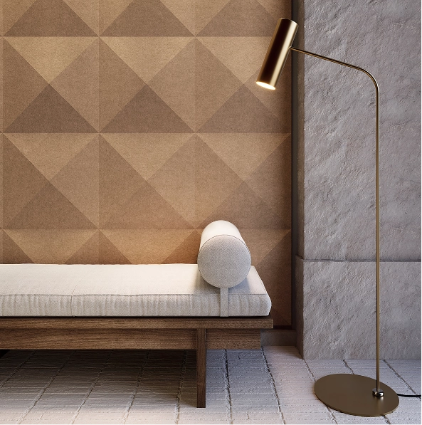 A contemporary bedroom with a bed, a lamp, and decorative acoustic art, enhancing the room's aesthetic appeal.