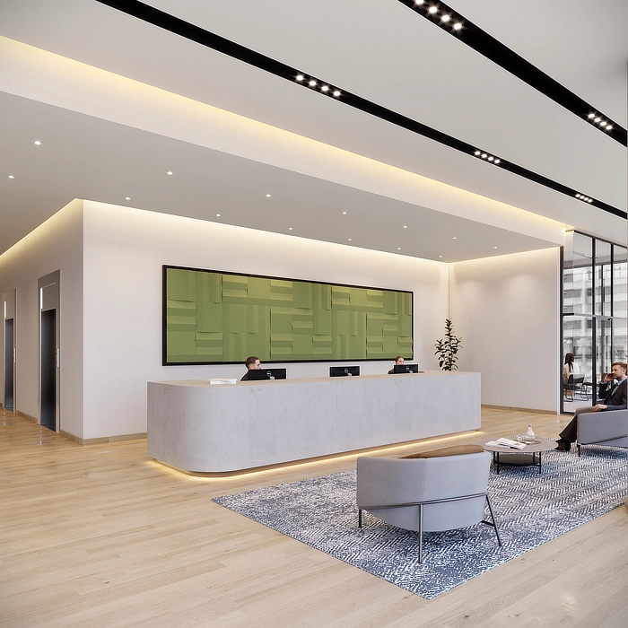 A reception that has a green Rubik by EzoBord acoustic frame on the wall.